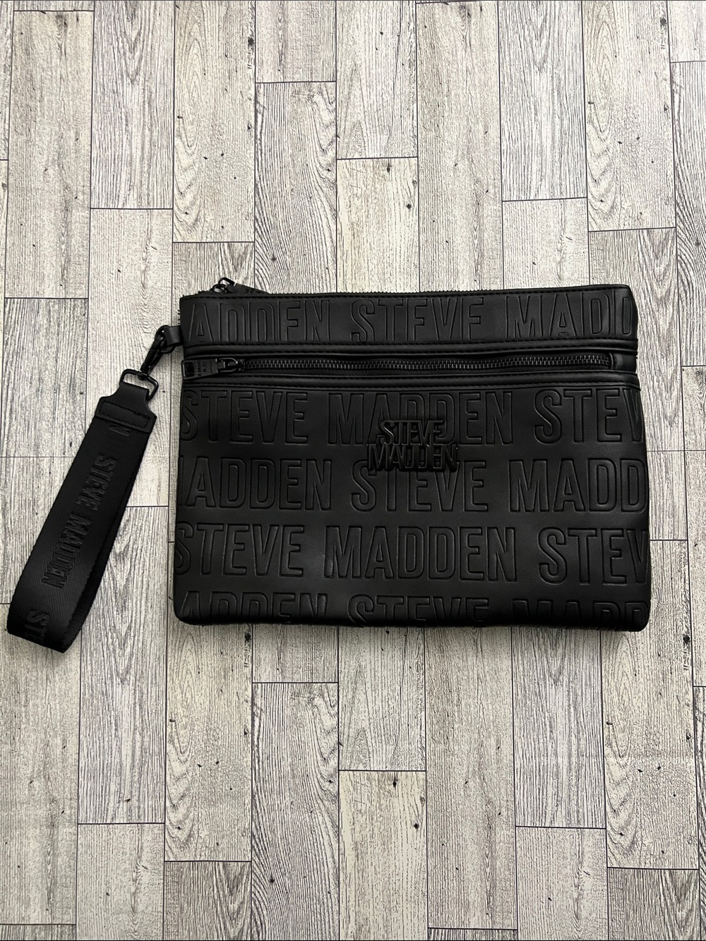 Steve Madden Black Embossed Logo Wristlet Pouch